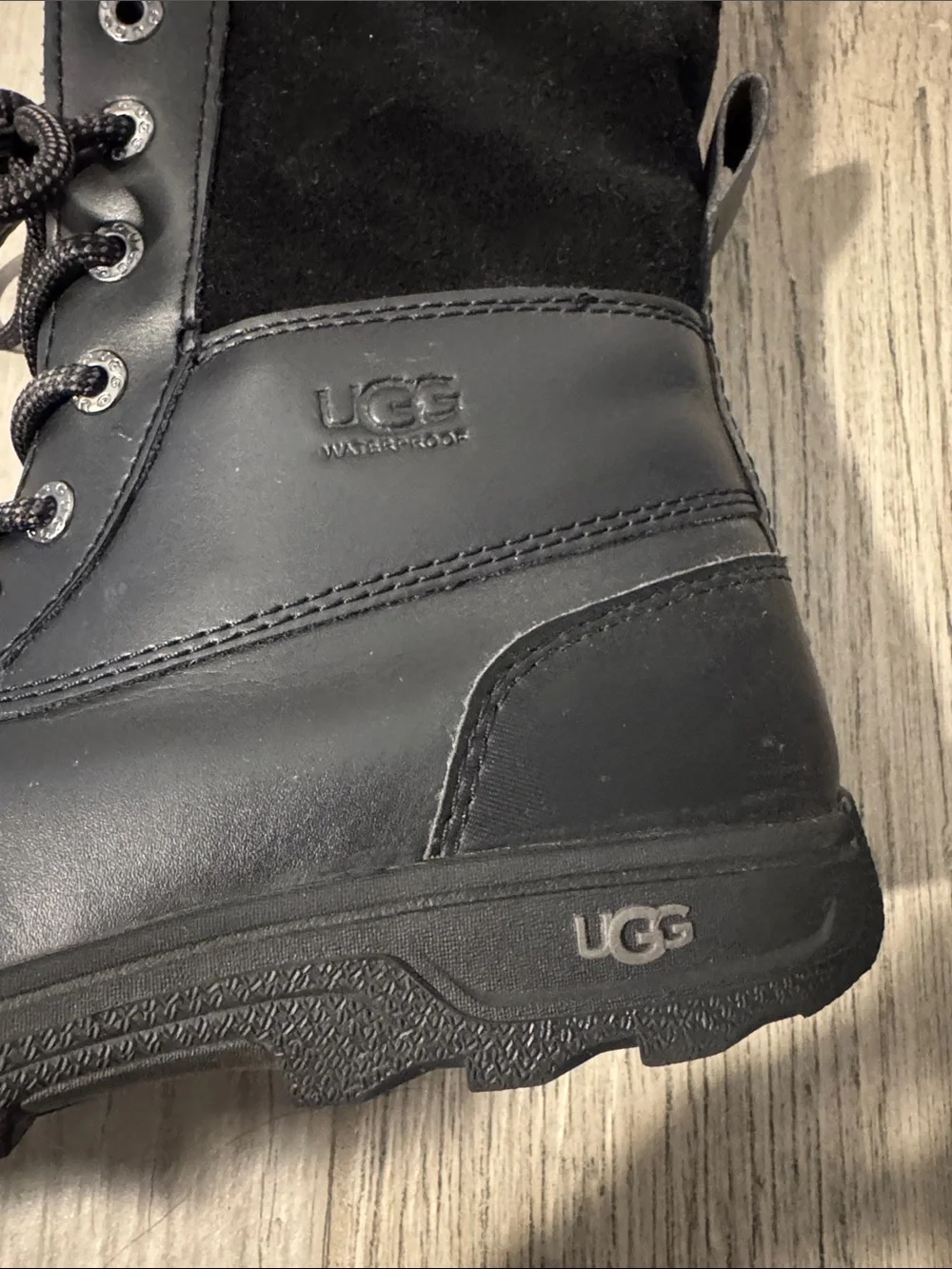 UGG Adirondack water proof insulated lace up winter boots.